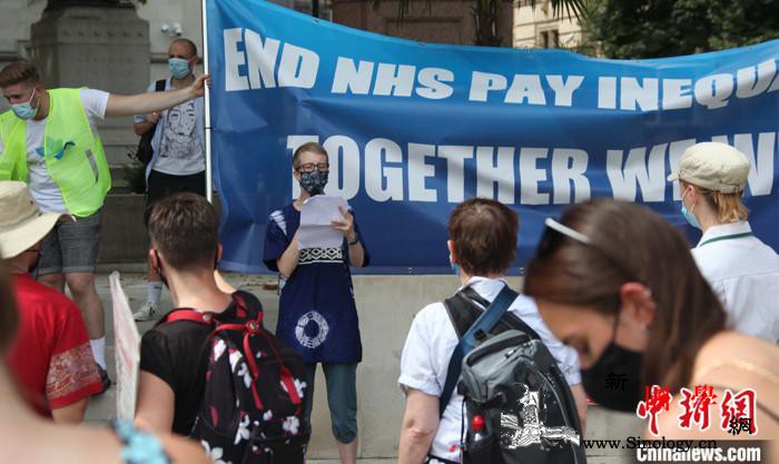 英国数百护士上街游行抗议薪资不公_伦敦-英国-薪资-