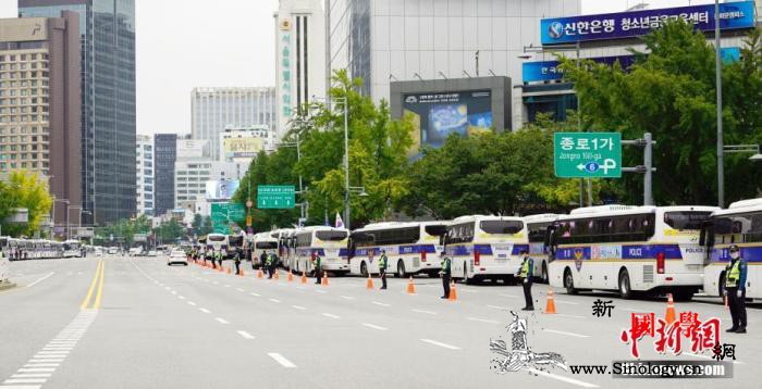 韩民间团体发起“免下车”集会首尔调大_民间团体-警力-韩国-