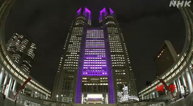 日本开展反家暴运动东京政府大楼点亮紫_日本-点亮-紫色-