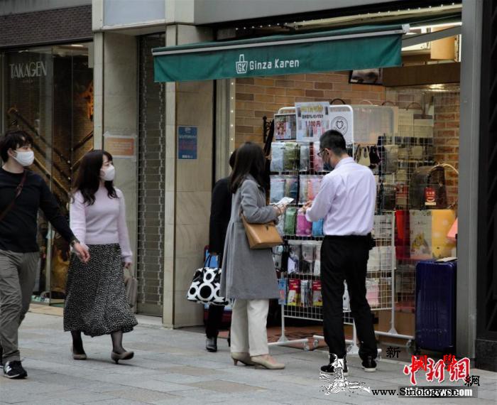 医疗机构频现聚集性感染日本向多地派专_东京-日本-口罩-