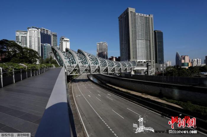 直击马来西亚再“封城”：警方设卡限出_吉隆坡-马来西亚-图为-
