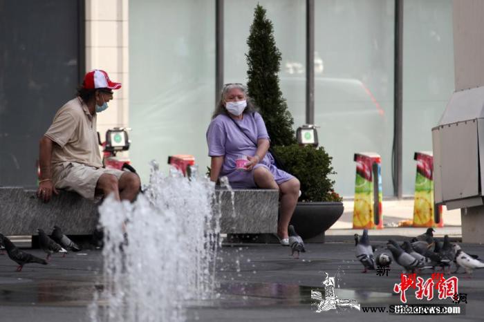 加拿大多个省份逐步解封重启_解封-加拿大-接种-