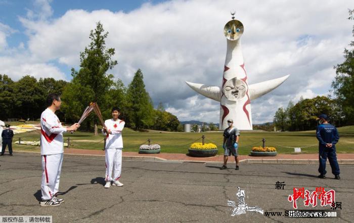 为避免密集东京都决定暂缓在公路上传递_东京-疫情-圣火-