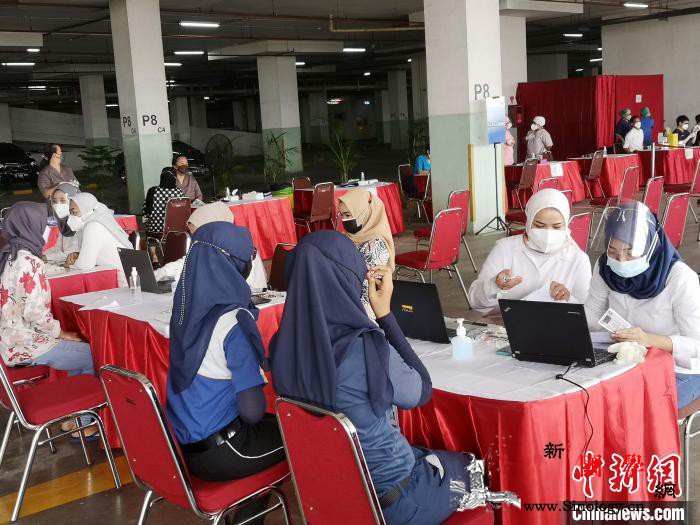 印尼累计确诊新冠超300万例疫苗接种_印尼-接种-雅加达-